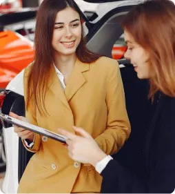 woman signing a contract