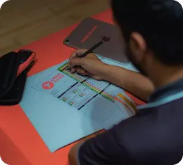 man with inspection paper